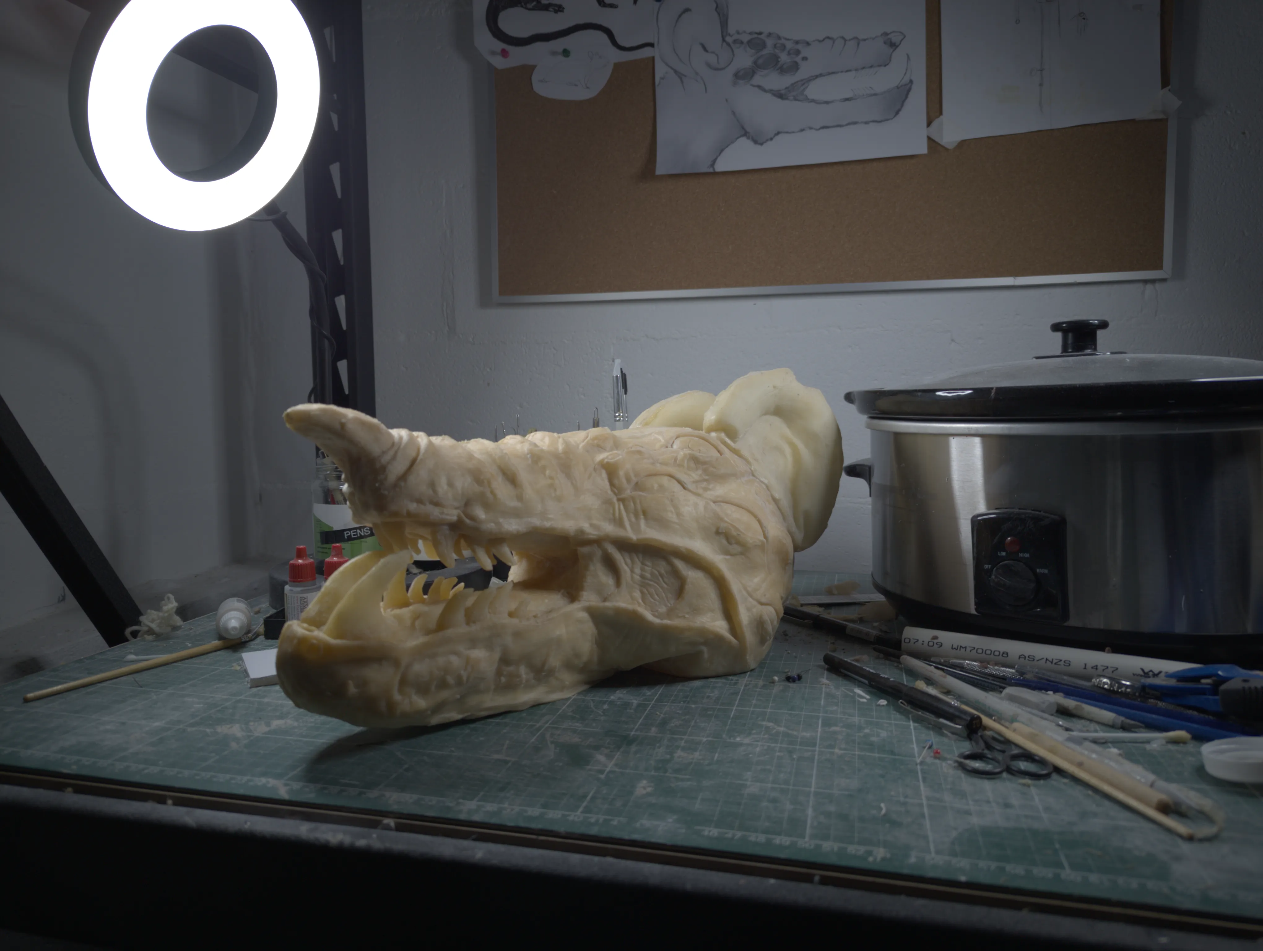 Finished latex puppet head on workbench