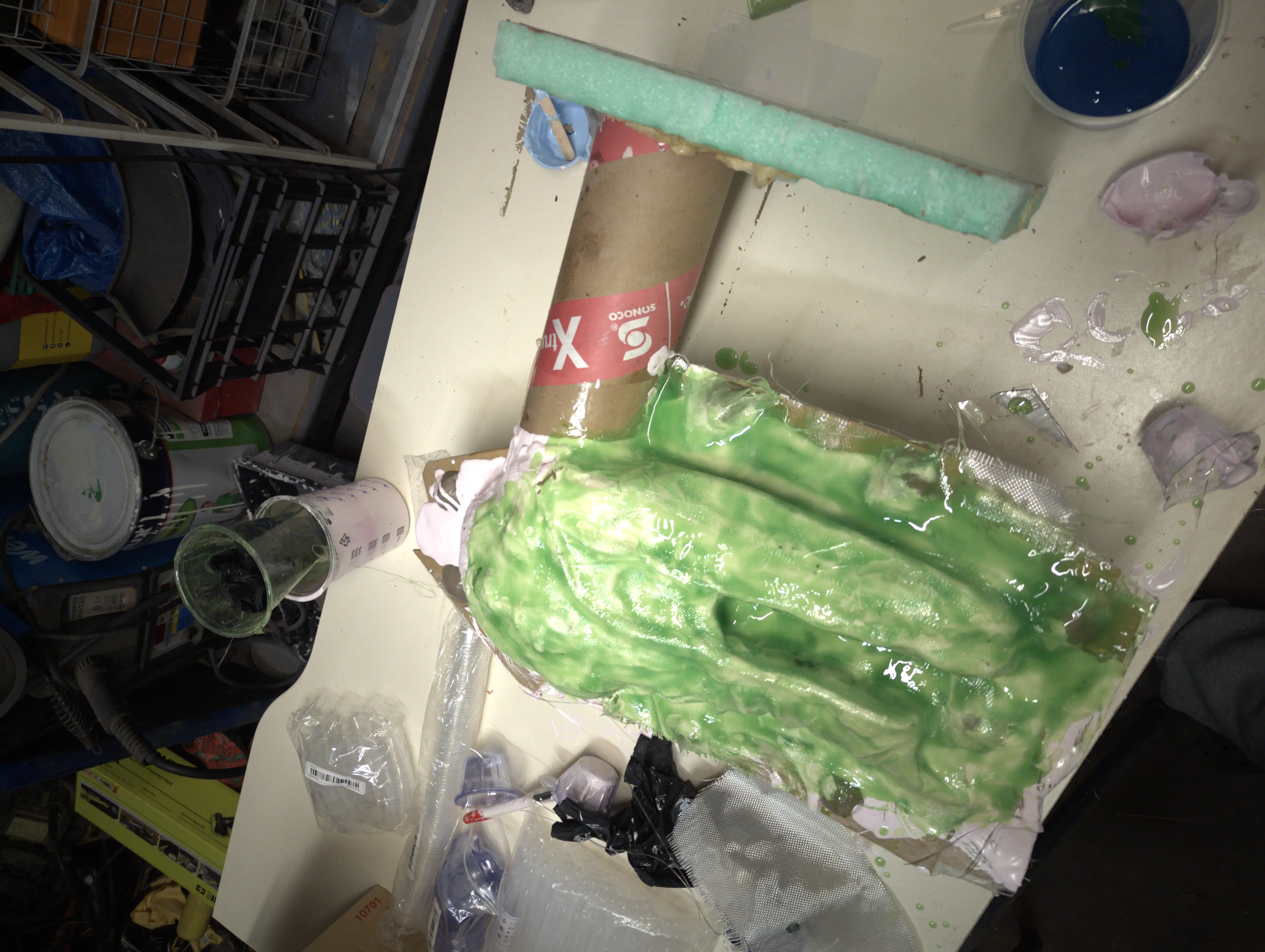 Fiberglass and silicone shell applied over clay sculpt