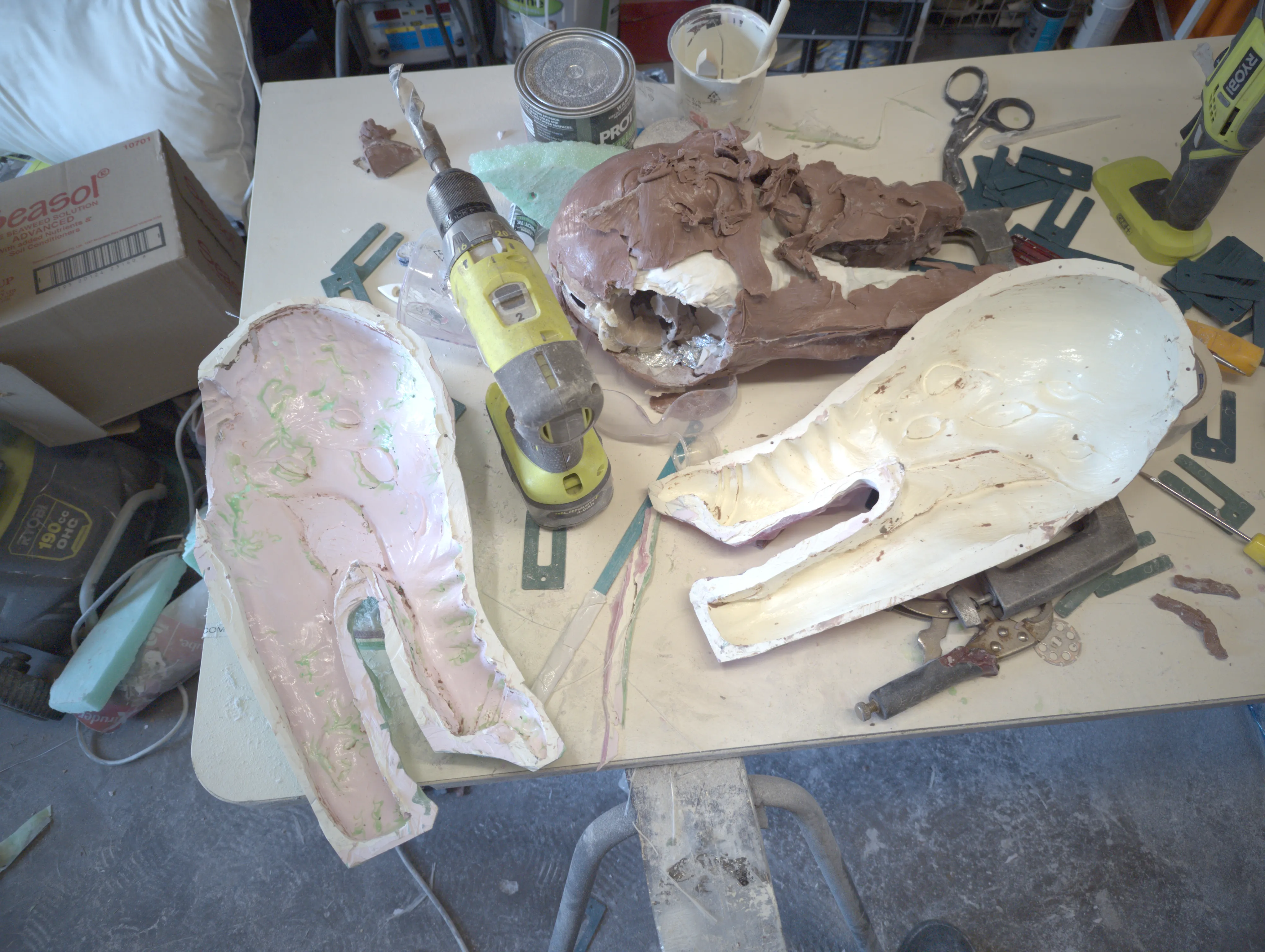 Opened two-part mold and remaining clay core