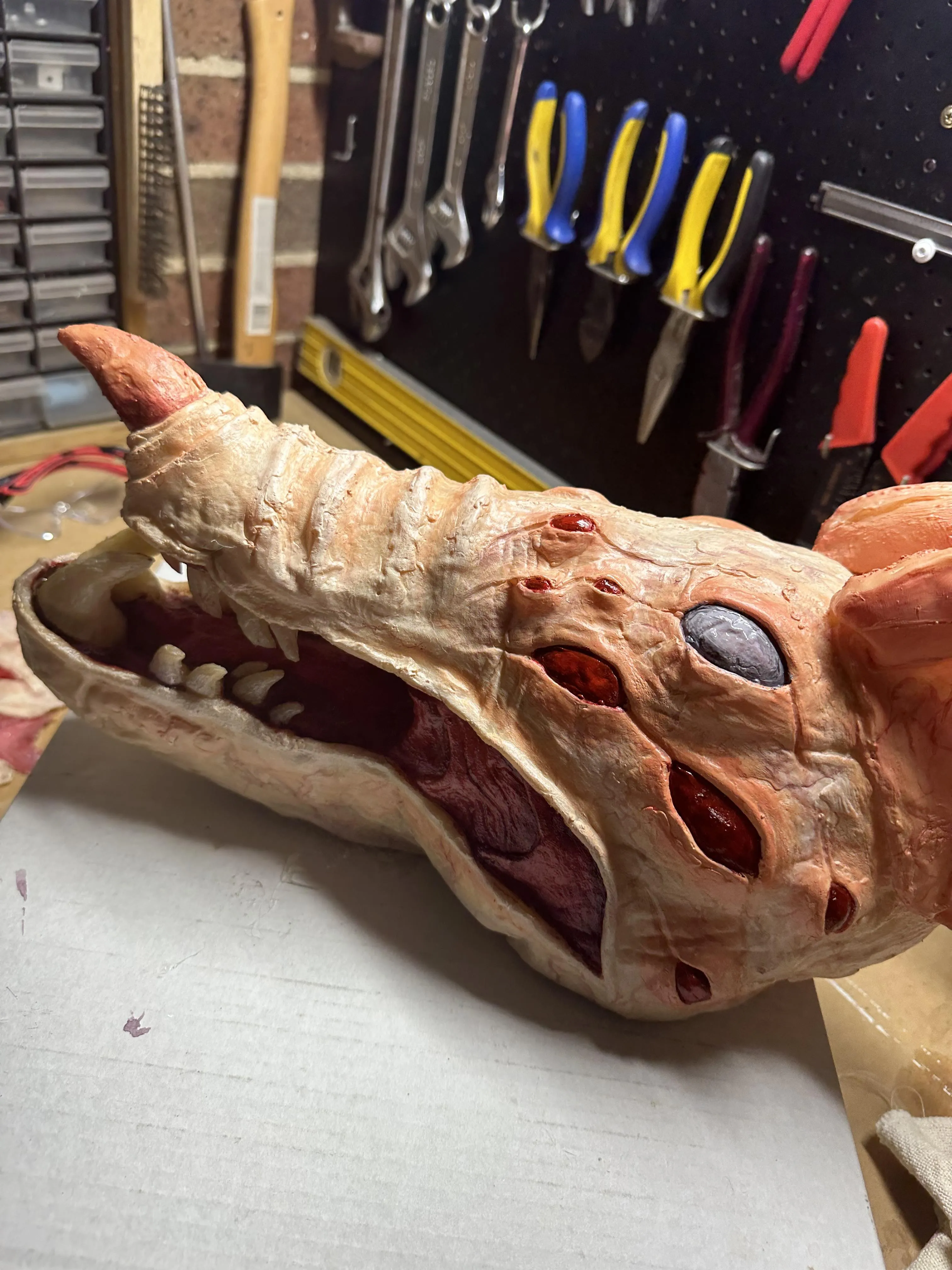 Side view of painted Vermin head showing final surface detail